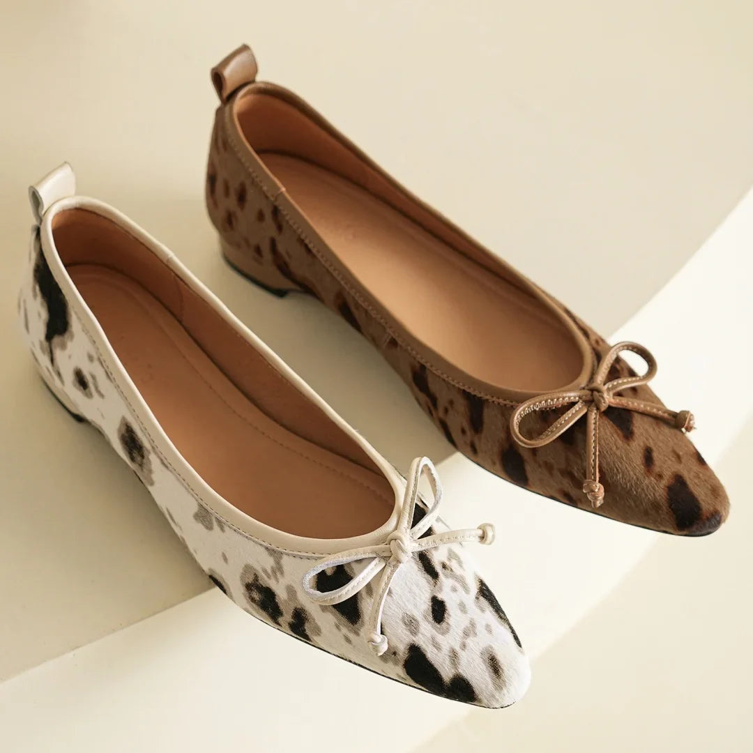 Women's Leather Flats in Bold Cow Print