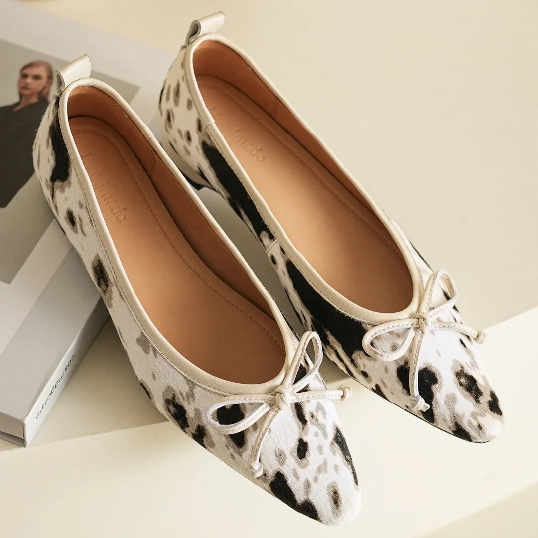 Women's Leather Flats in Bold Cow Print in Beige