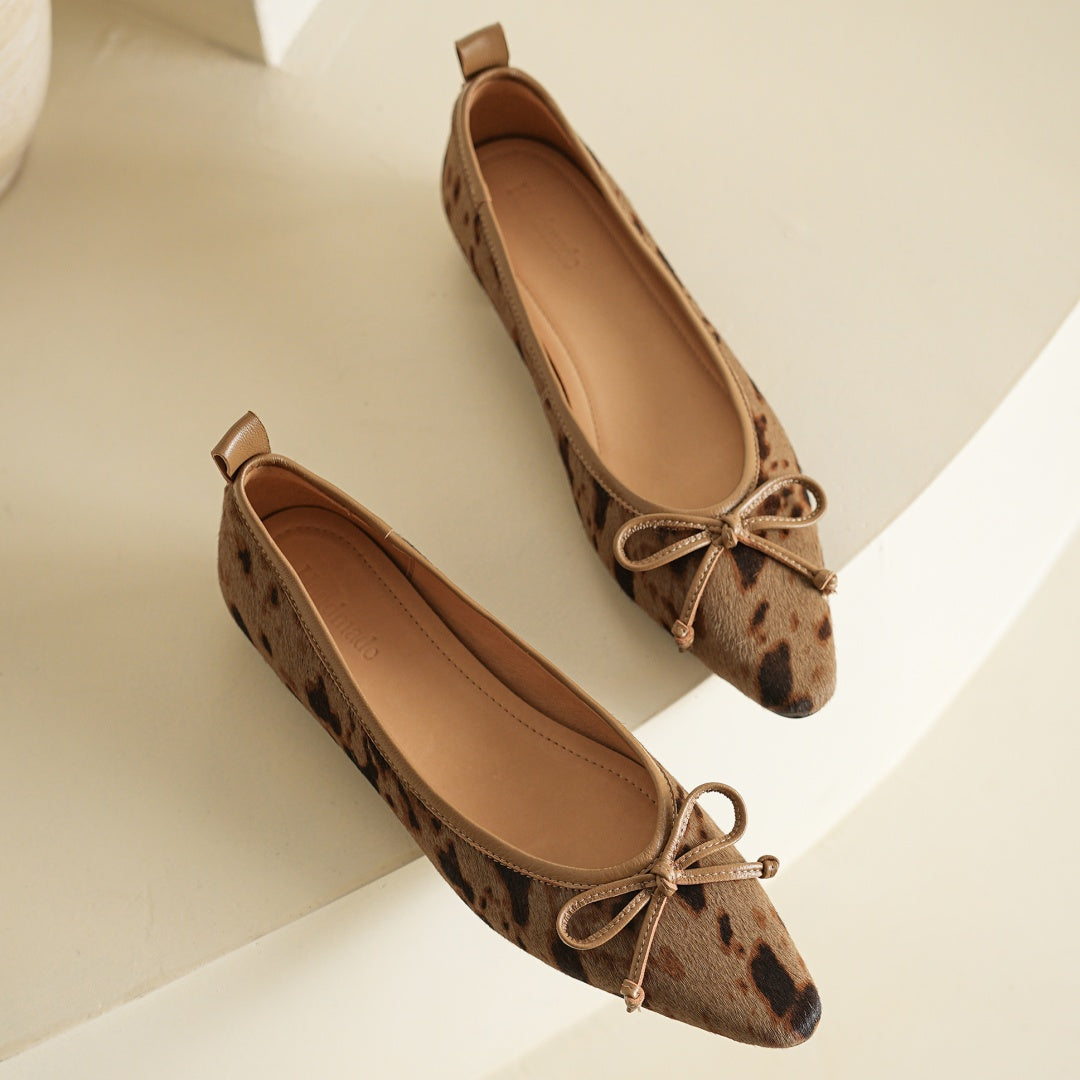 Women's Leather Flats in Bold Cow Print in Brown