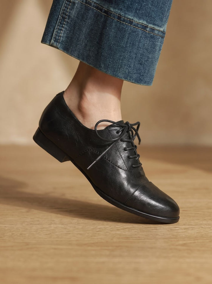 Women's Leather Flats with Classic Cap-Toe Design in Black